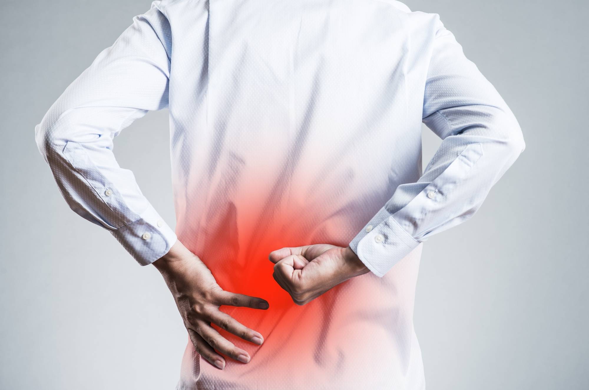 man experiencing low back pain