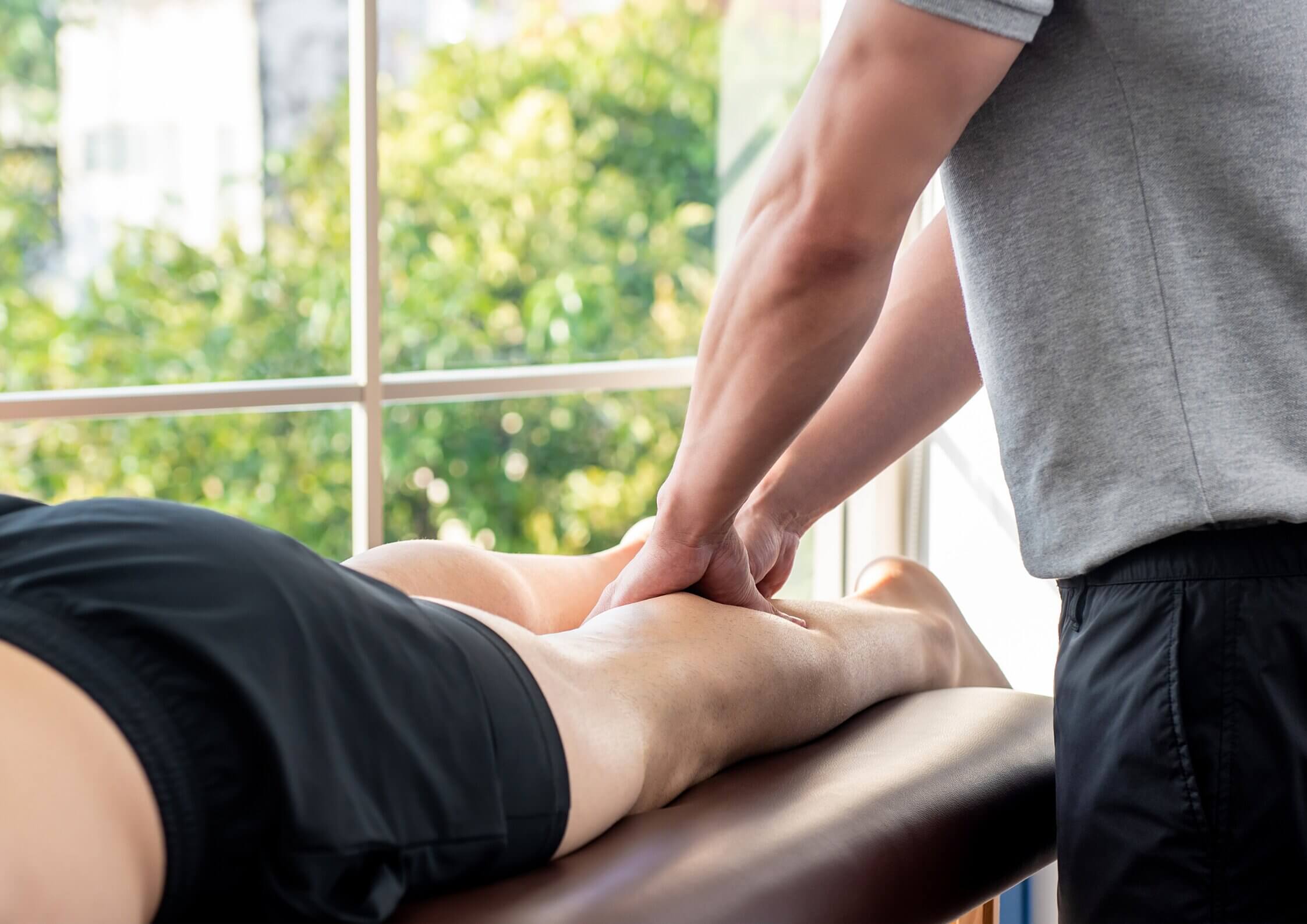 A man is stretching his leg