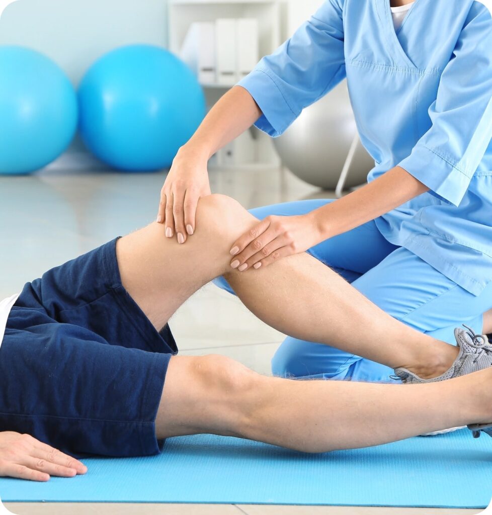 physiotherapist-working-with-male-patient-rehabilitation-center